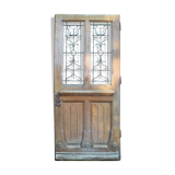 Oak entrance door at double chassis opening