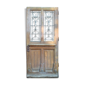 Oak entrance door at double chassis opening
