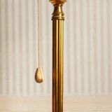 "Pique candle" double fire floor lamp in gilded bronze