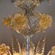 Venetian chandelier in gilded Murano glass, 24 light sources, three tiers, circa 1940.