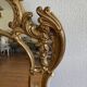 Large gold mirror in Louis XV style
