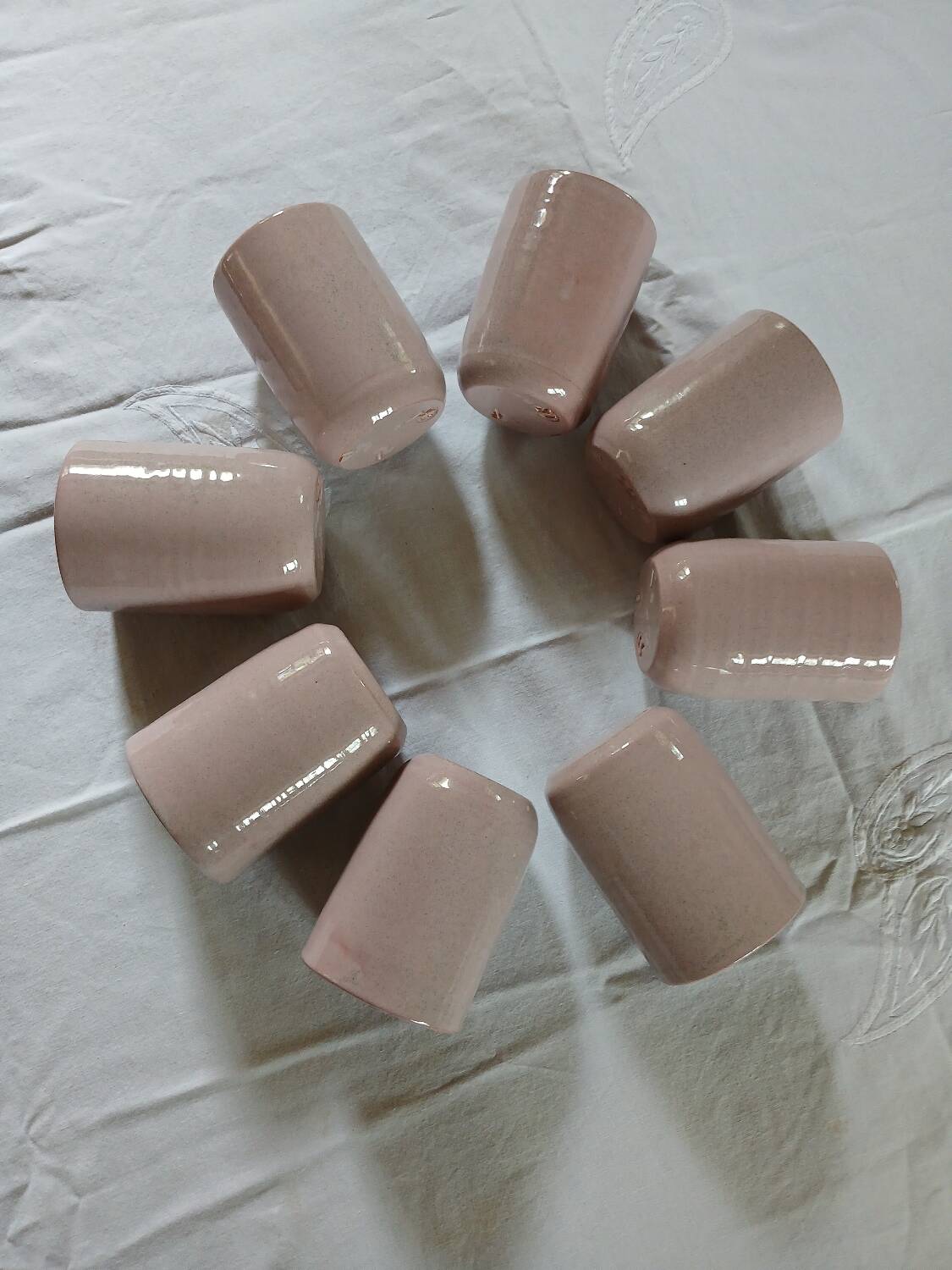 8 signed enamelled ceramic mugs