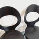Set of 4 vintage Mouette chairs by Baumann in black wood from the 1960s.