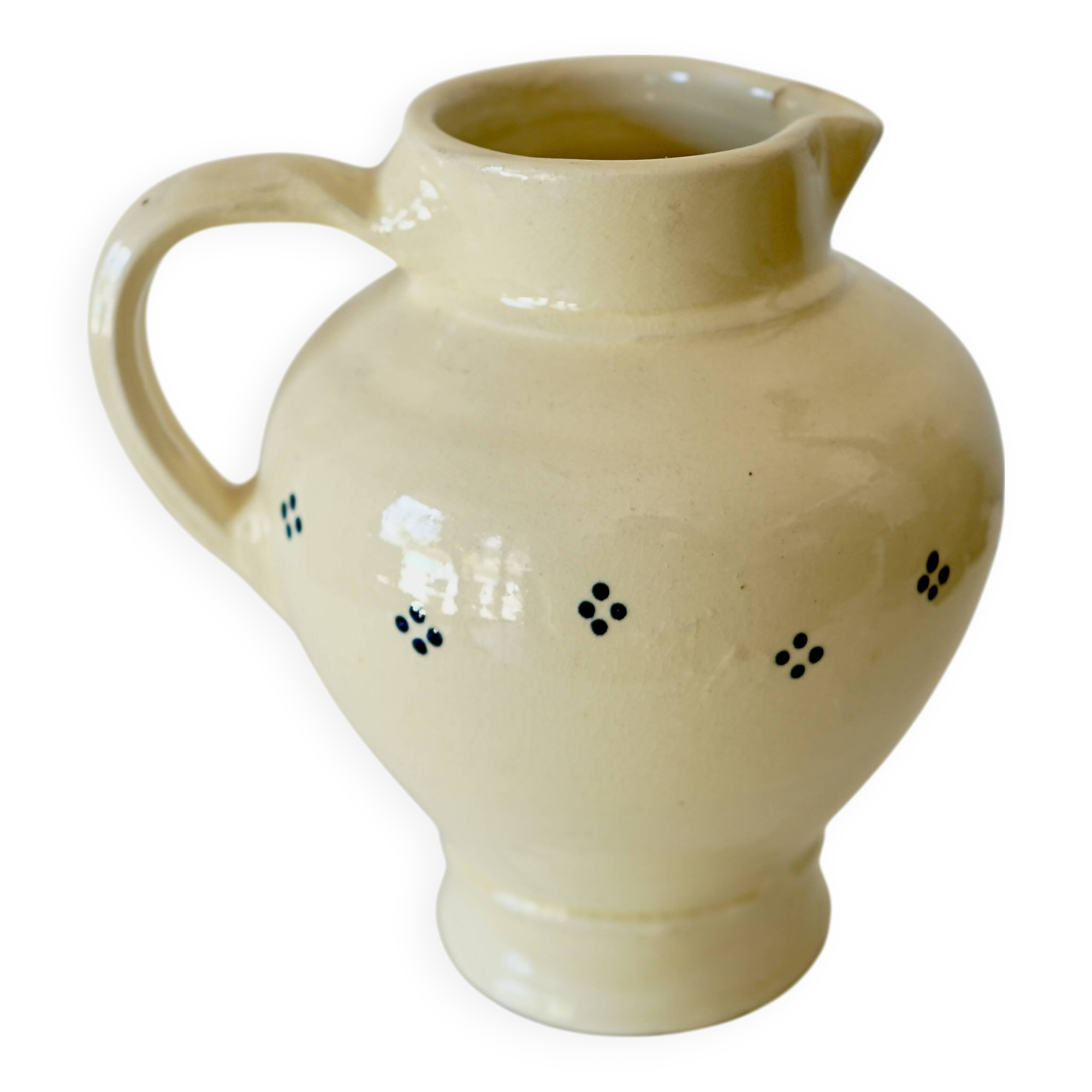Vintage butter yellow ceramic pitcher in rustic style
