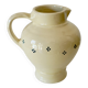 Vintage butter yellow ceramic pitcher in rustic style