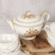 Porcelain tea service by Théodore Haviland, gilded patterns.