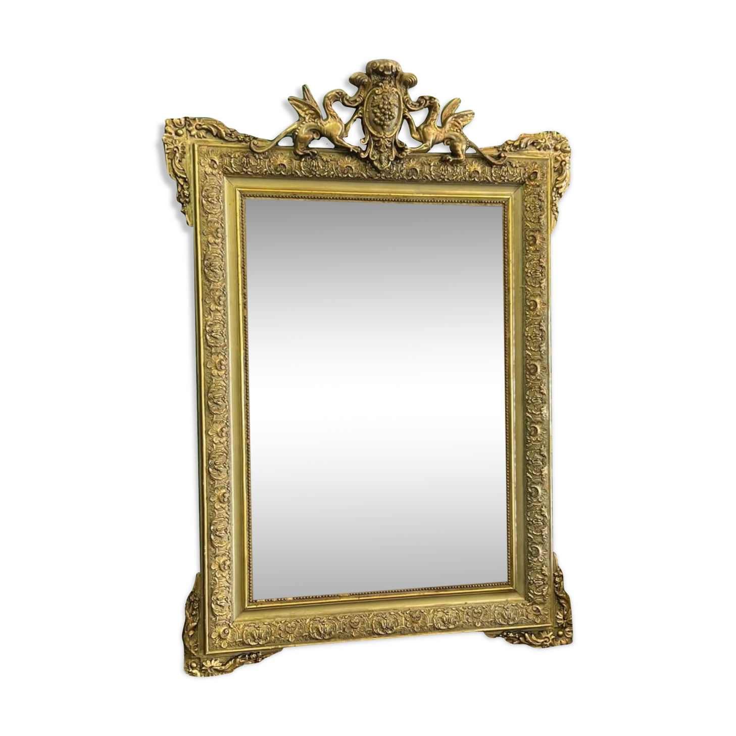 Old Napoleon III mirror decorated with a griffin