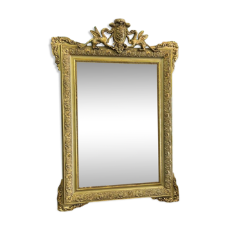 Old Napoleon III mirror decorated with a griffin