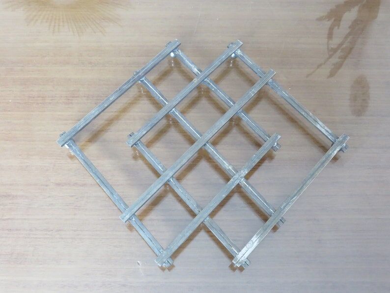 Extendable silver metal underside 40s 50s