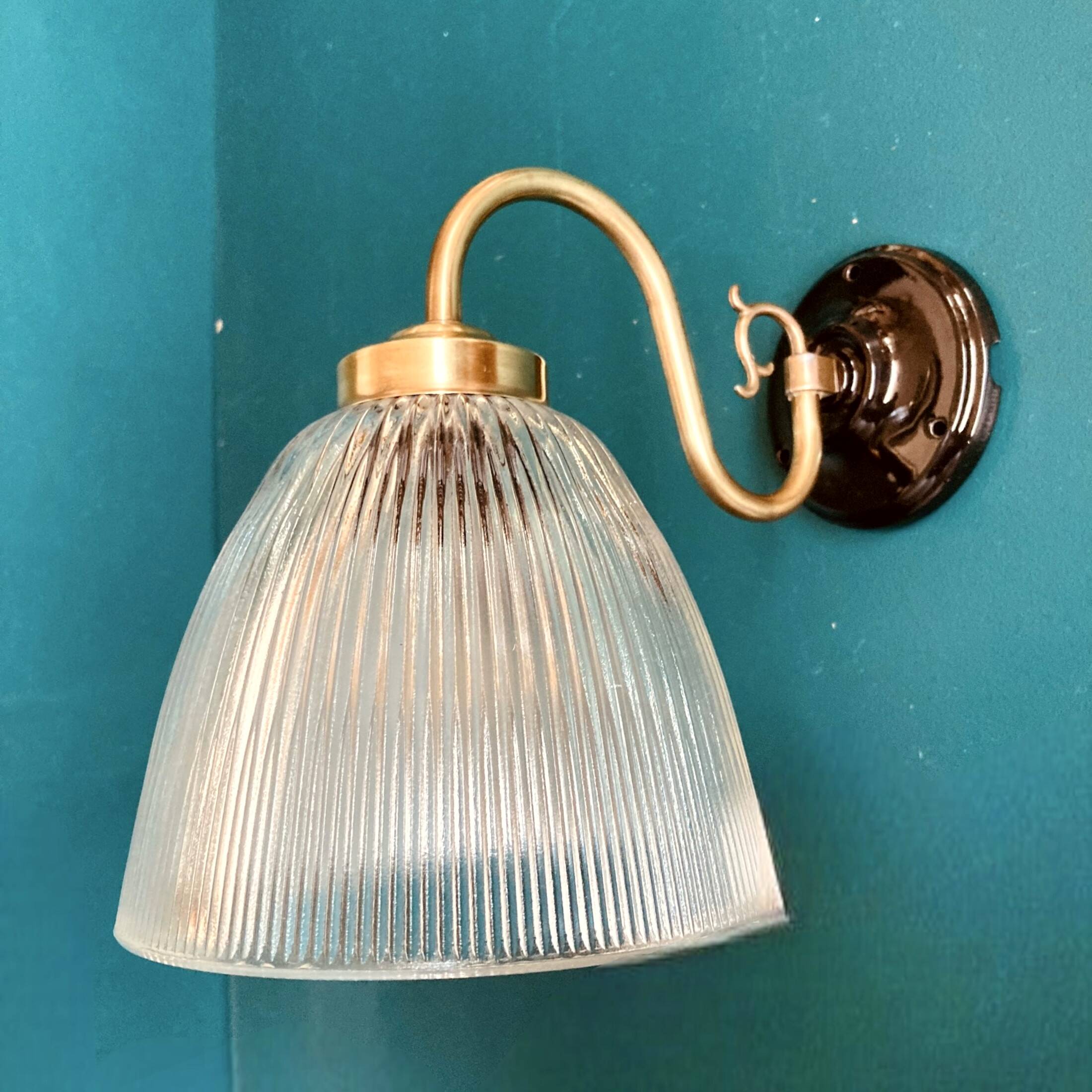 Brass swan neck wall light and prismatic glass tulip vintage porcelain rosette