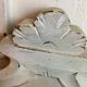 Old patinated gray pediment