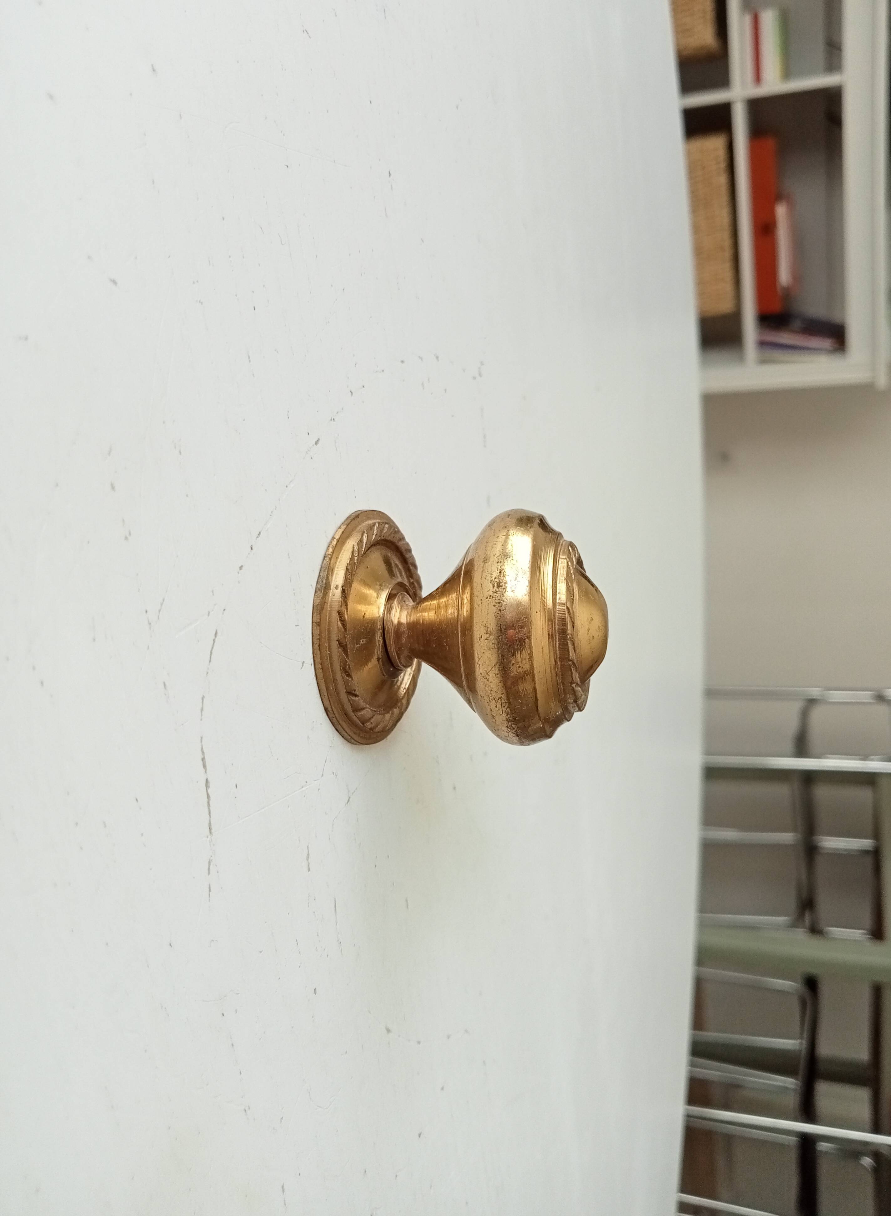 Vintage furniture knob in gilded brass