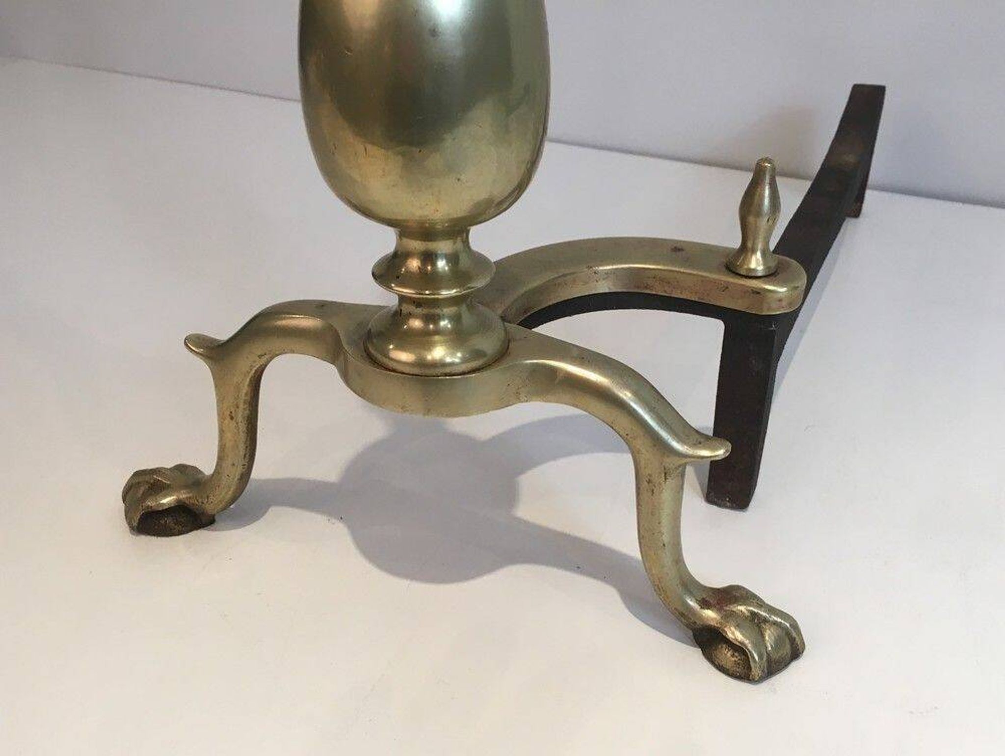Pair of neo-Gothic bronze and wrought iron andirons