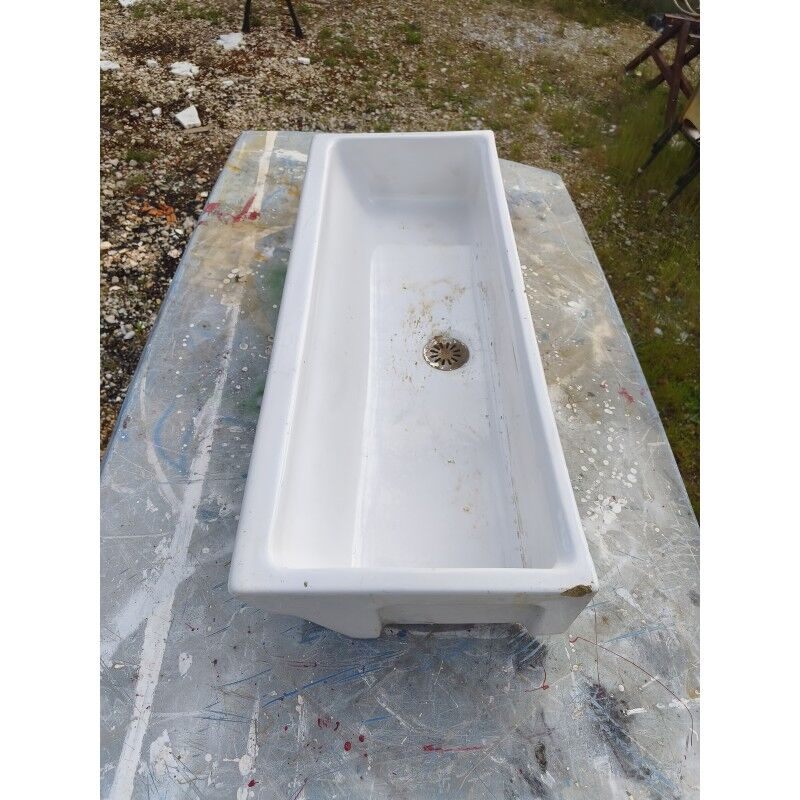 Old white glazed ceramic sink