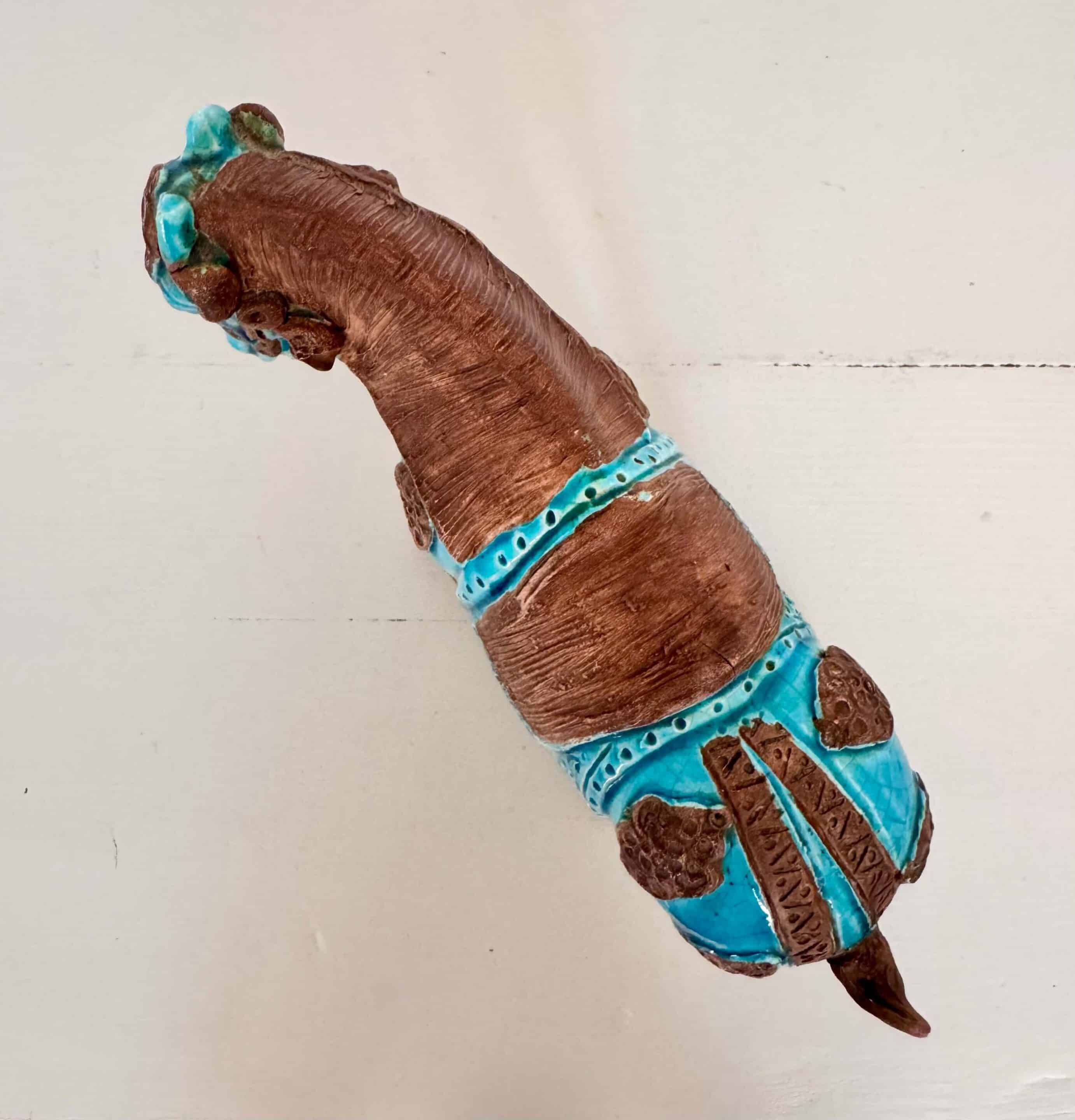 Sculpture of a Tang horse in turquoise blue earthenware