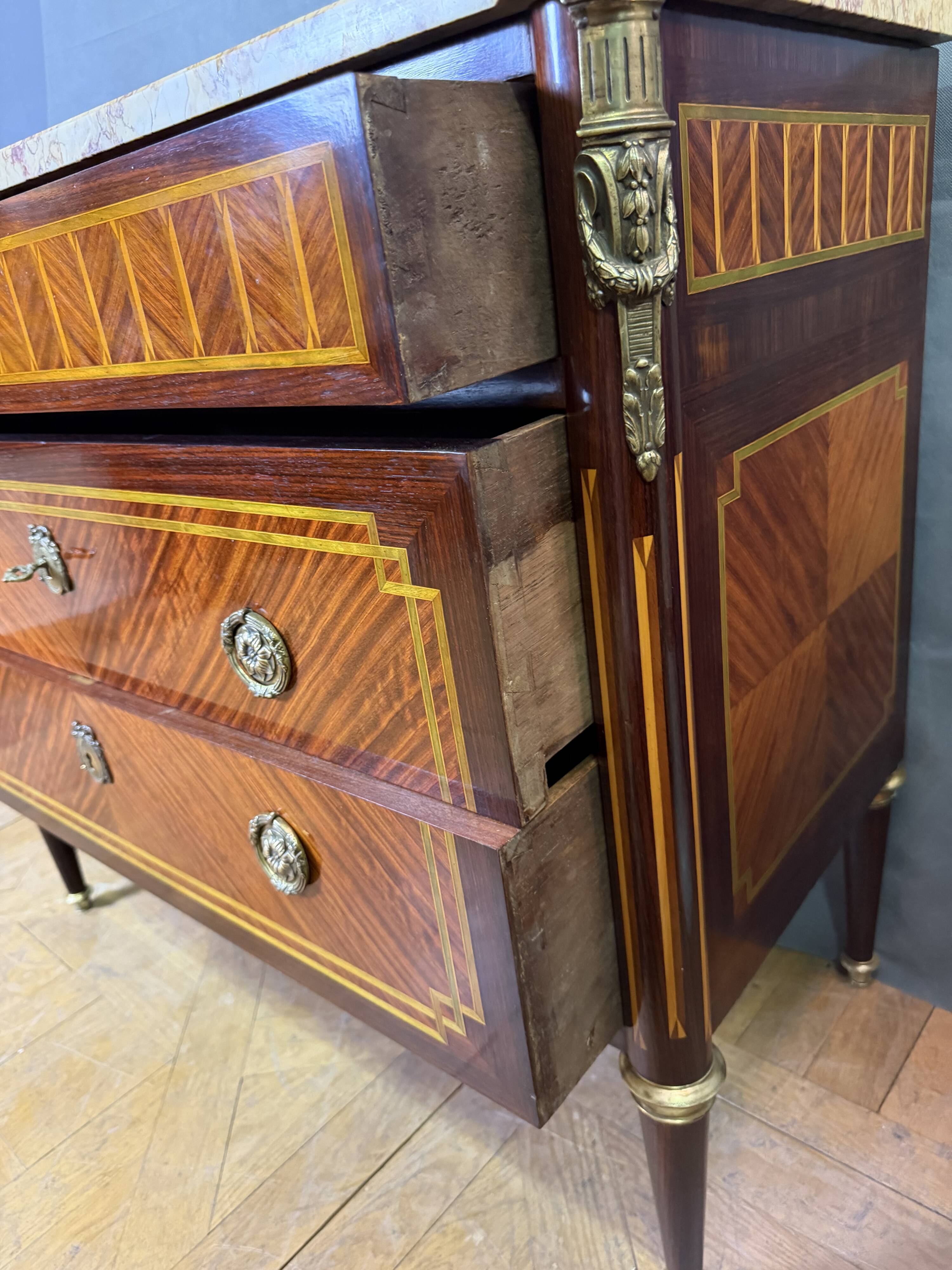 Louis XVI commode from the late 19th century.