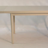 Beige extendable wooden table