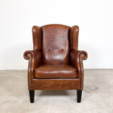 Vintage sheep leather wingback armchair by Lounge Atelier