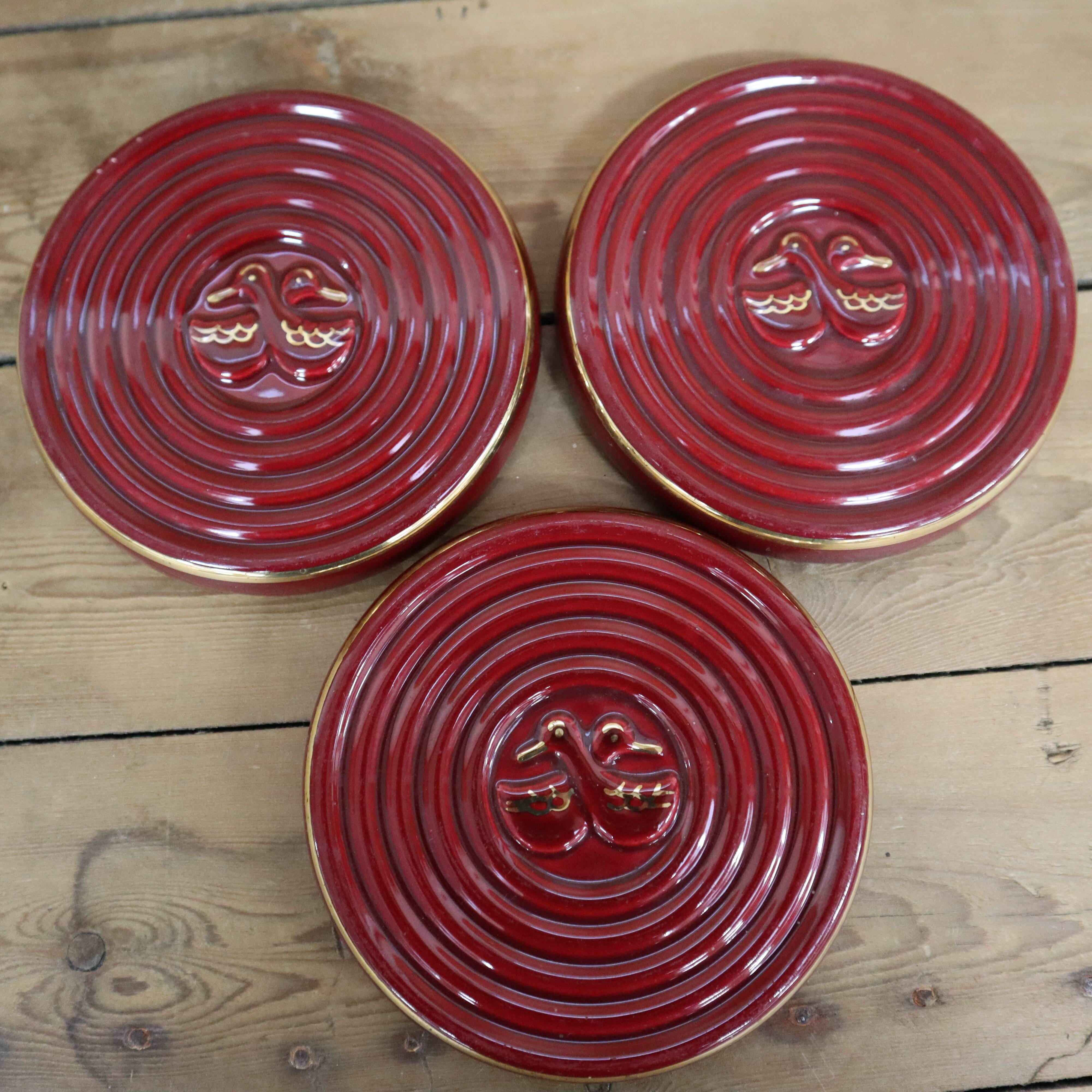 3 small vintage burgundy duck coasters or glasses with gold edging