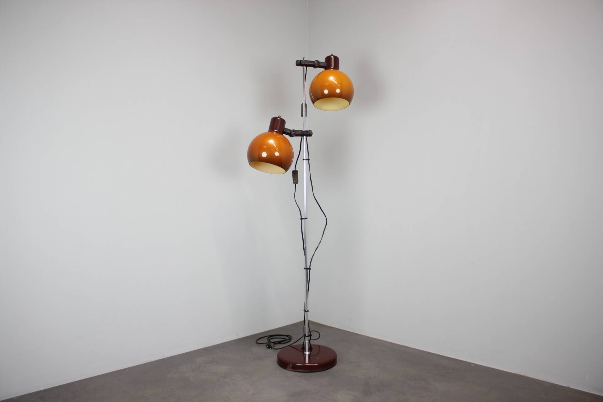 Vintage Hungarian adjustable floor lamp with two orange globe shades, circa 1970.