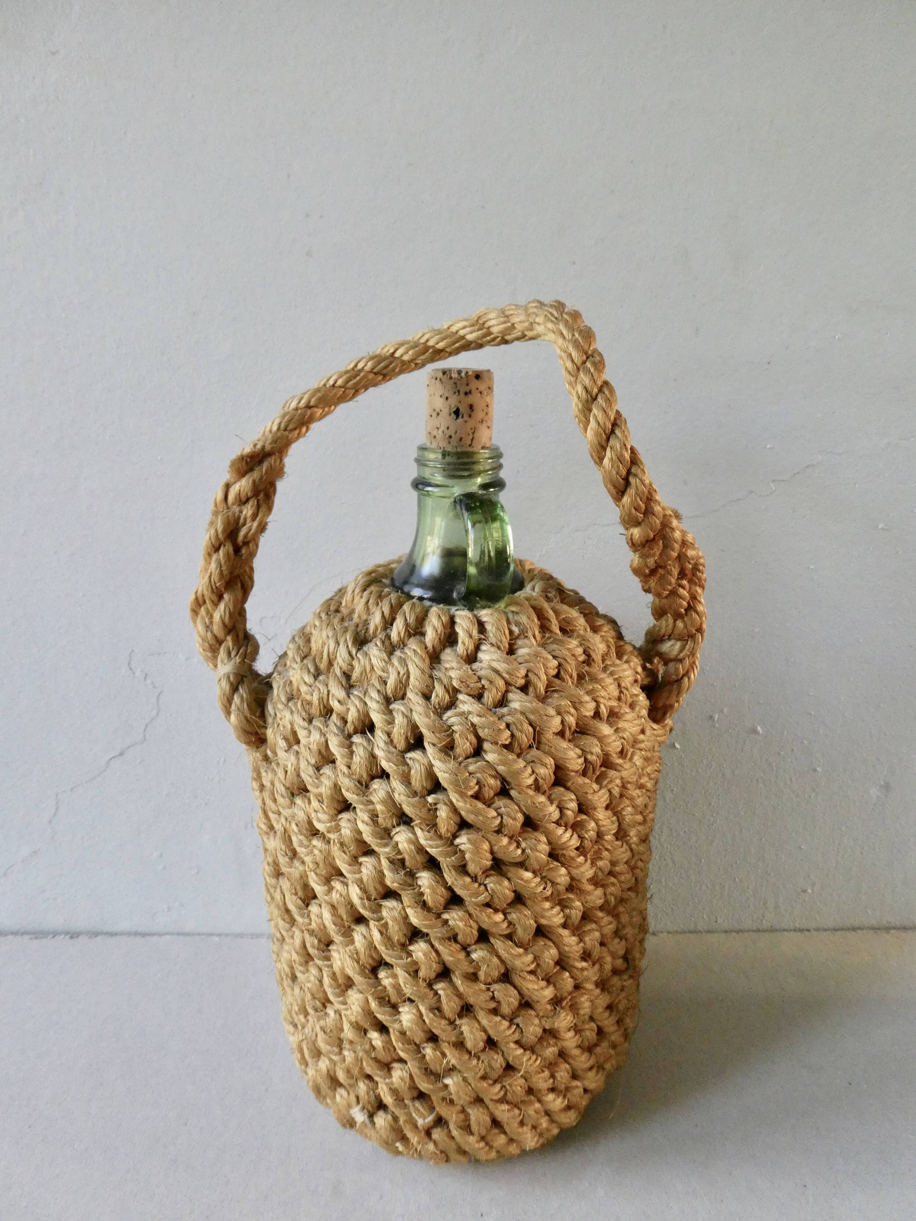 Glass bottle with braided rope, 60s