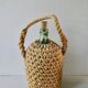 Glass bottle with braided rope, 60s