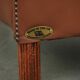 Cowhide club armchair in English style with comfortable seating.