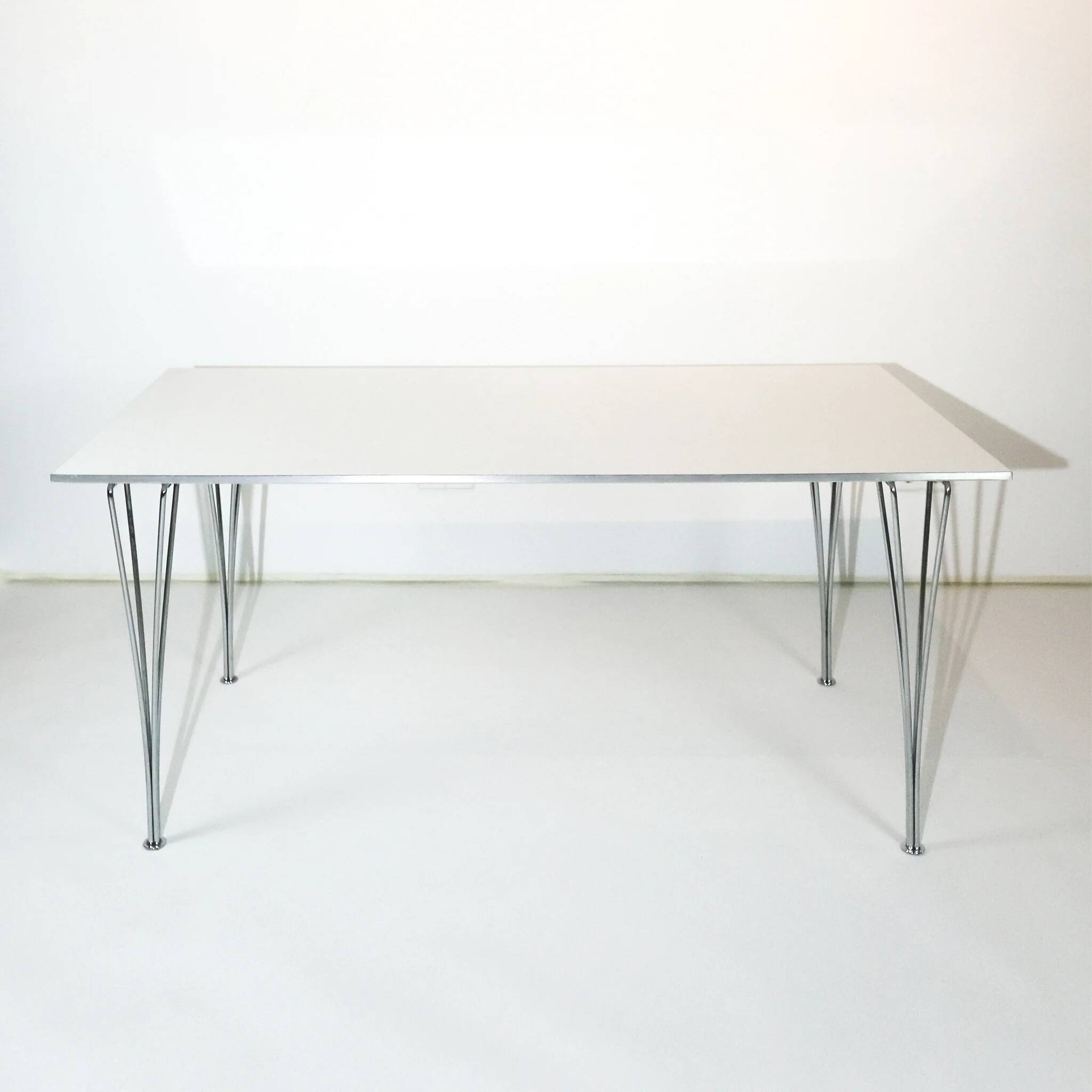 Vintage rectangular dining table by Piet Hein, Bruno Mathsson and Arne Jacobsen for Fritz Hansen, Sweden.