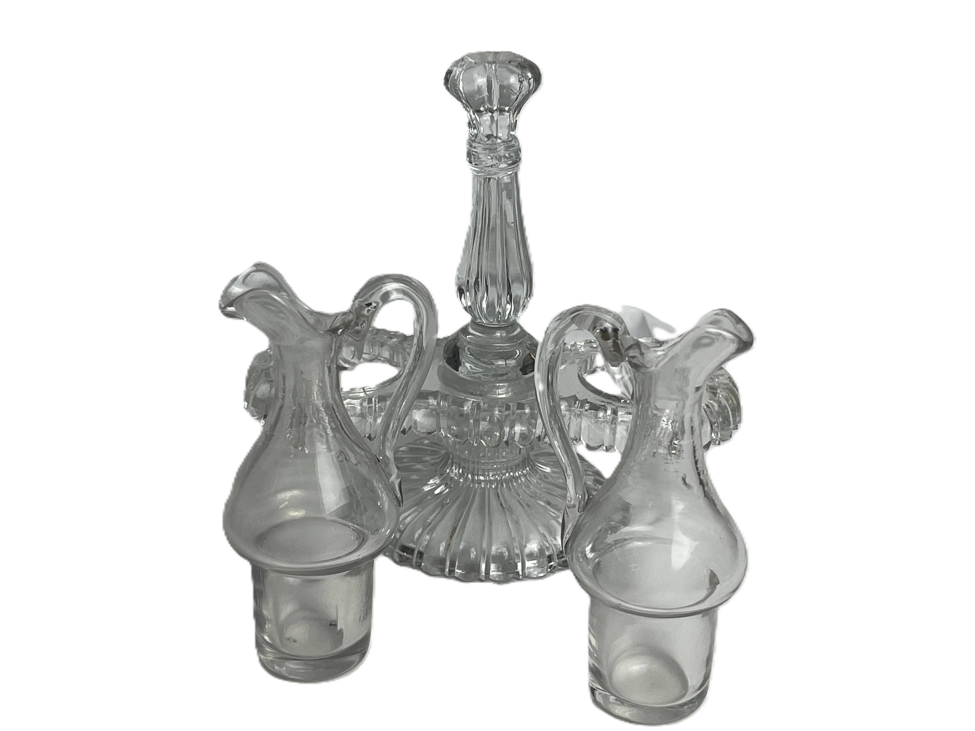 Tableware, two moulded glass table servants from the early 20th century.