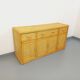 Vintage storage unit in rattan and woven rattan from the 1970s.