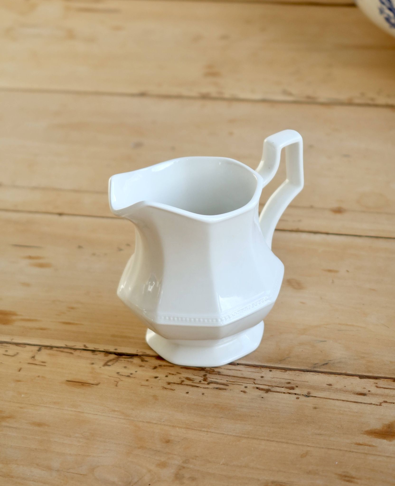 English porcelain milk jug by Johnson Brothers, model Pearl, with design.