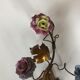 Two bronze wall light decorated with flowers in german porcelain