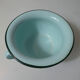 Old green enamelled steel pot cover