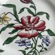5 plates with colorful Sarreguemines floral designs.