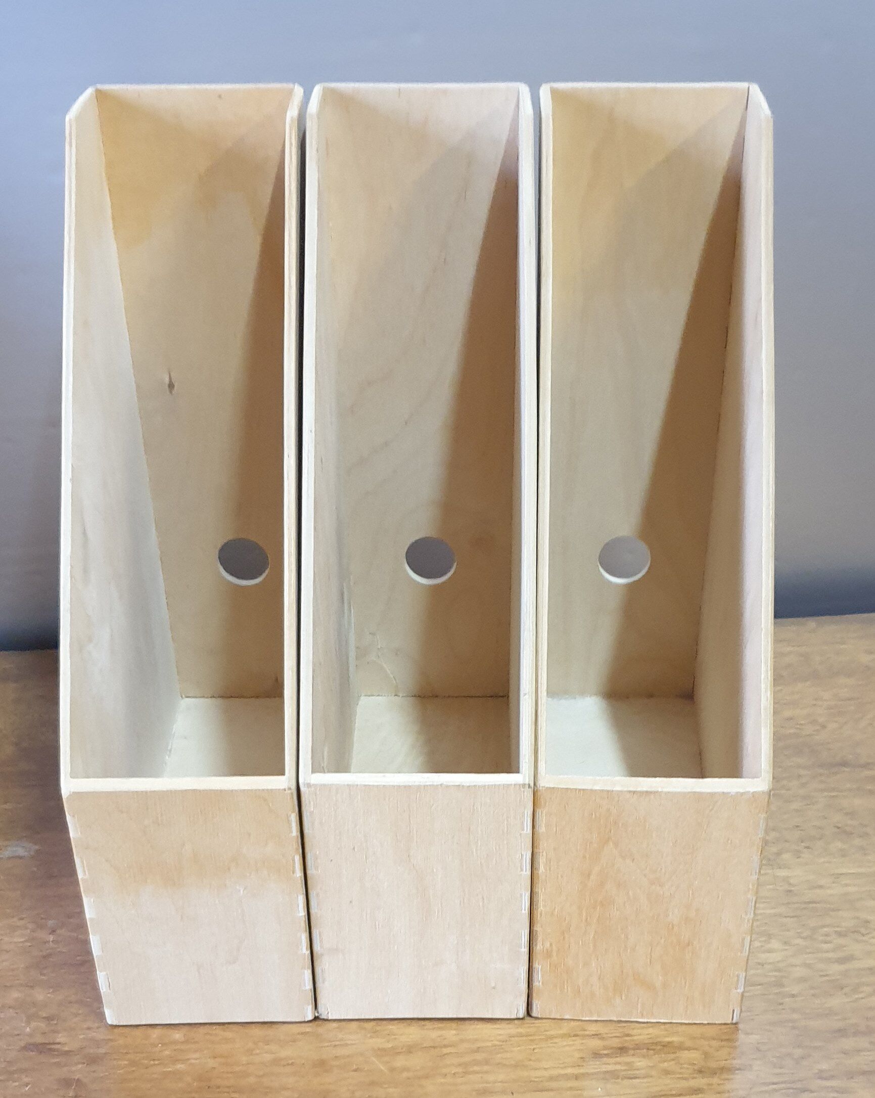 Trio of wooden filing cabinet racks