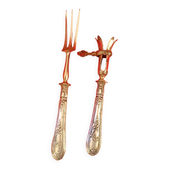 Pair of cutlery for serving lamb.