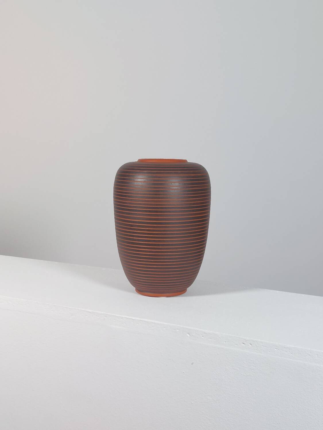 Ceramic vase decorated with vintage sgraffito by Rudi Stahl.