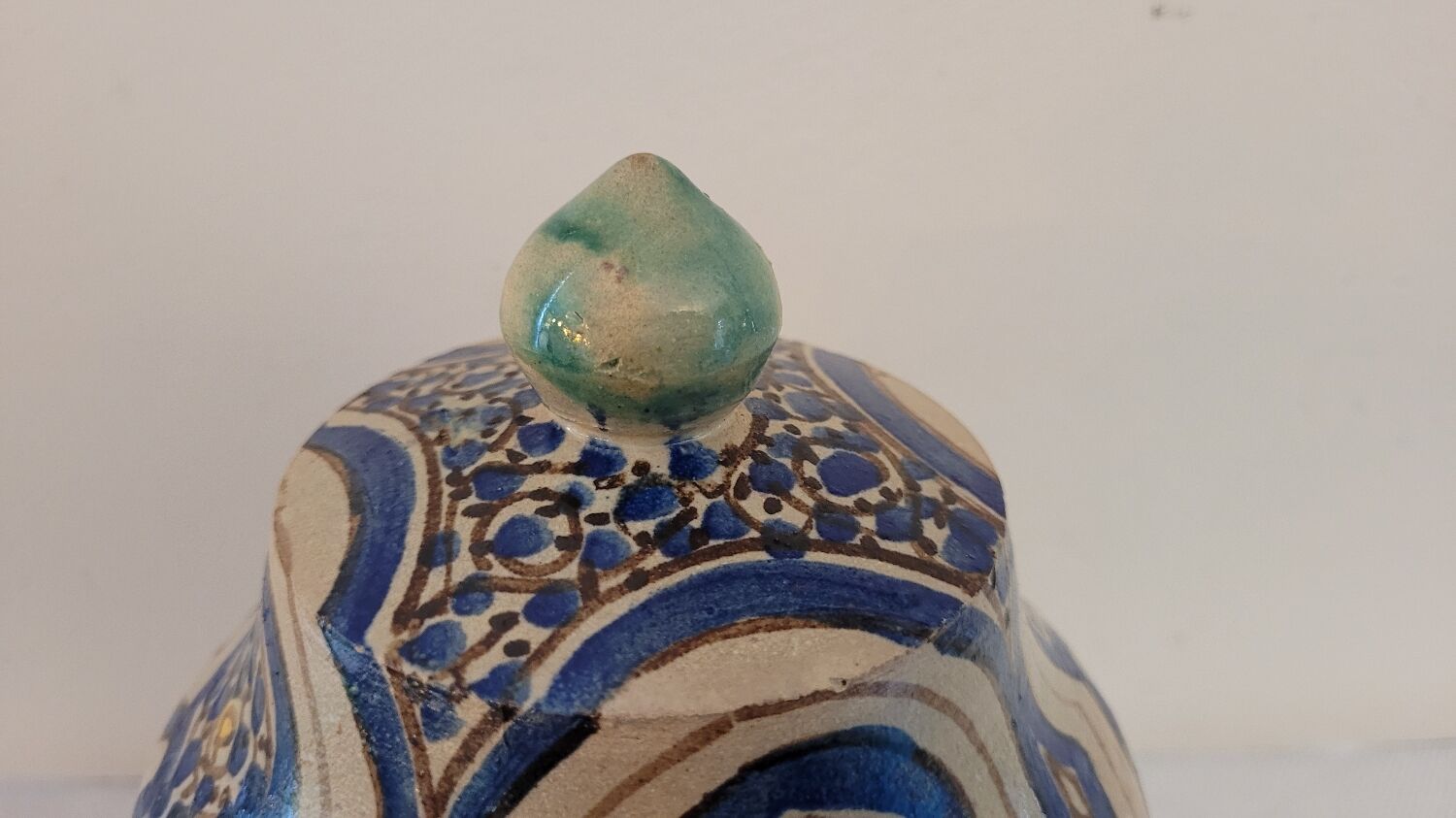 Pot in painted earth