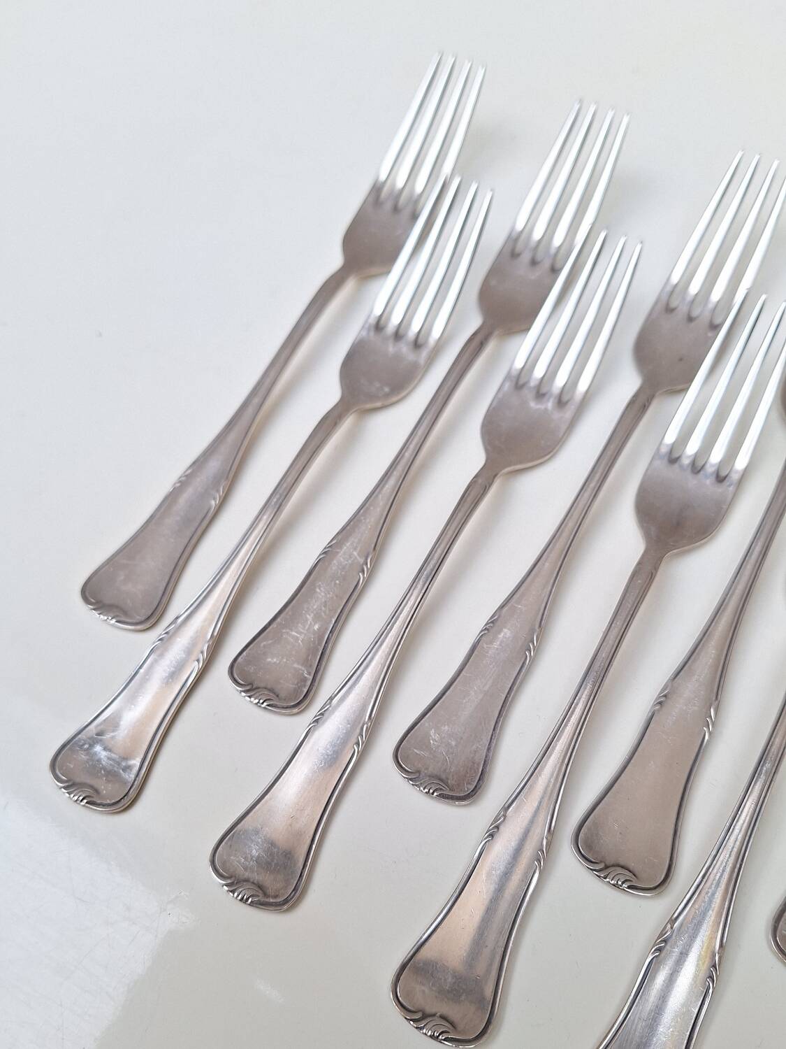 Set of small silver-plated metal forks