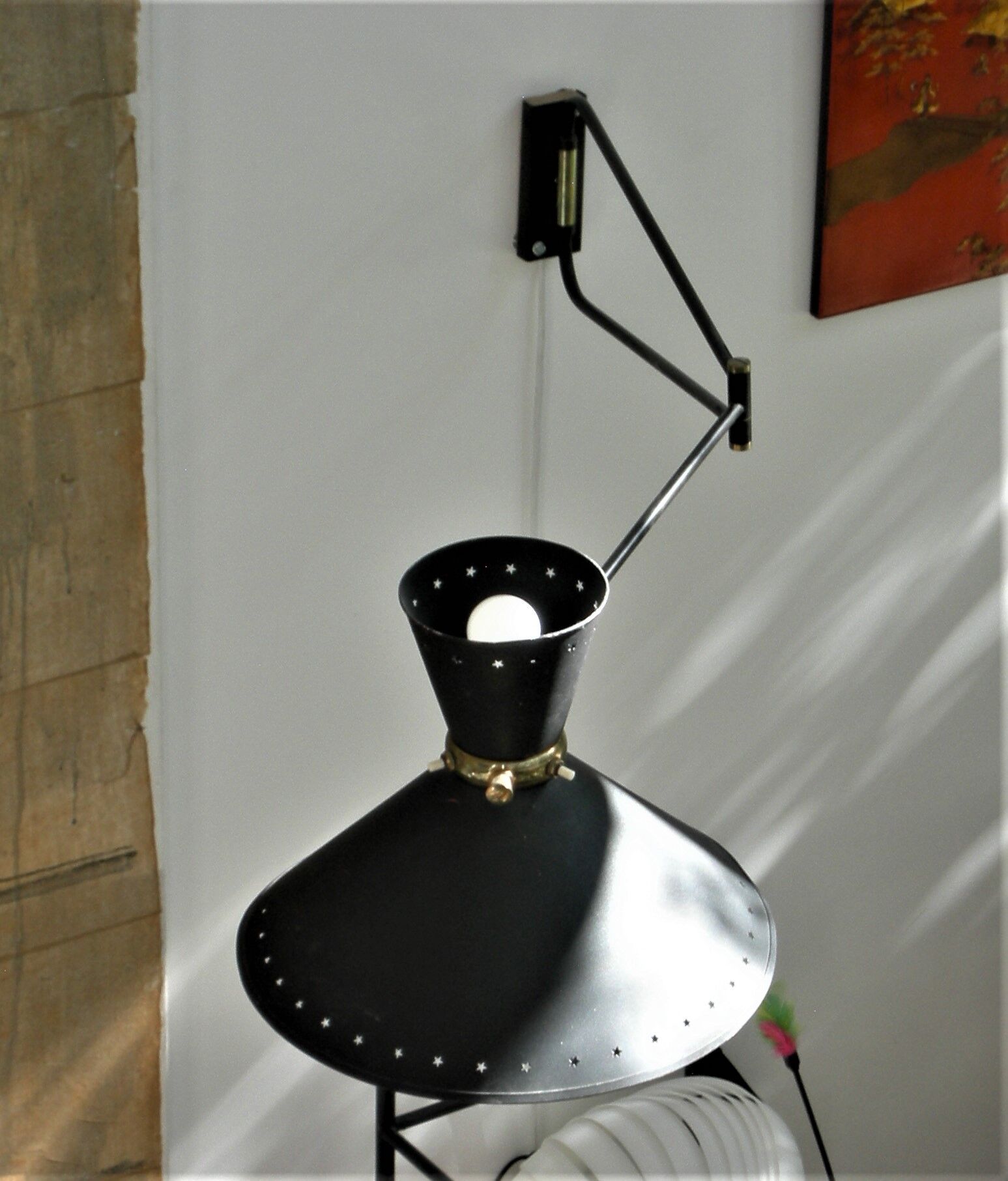 Roger Mathieu's diabolo sconce for Lunel with double lighting