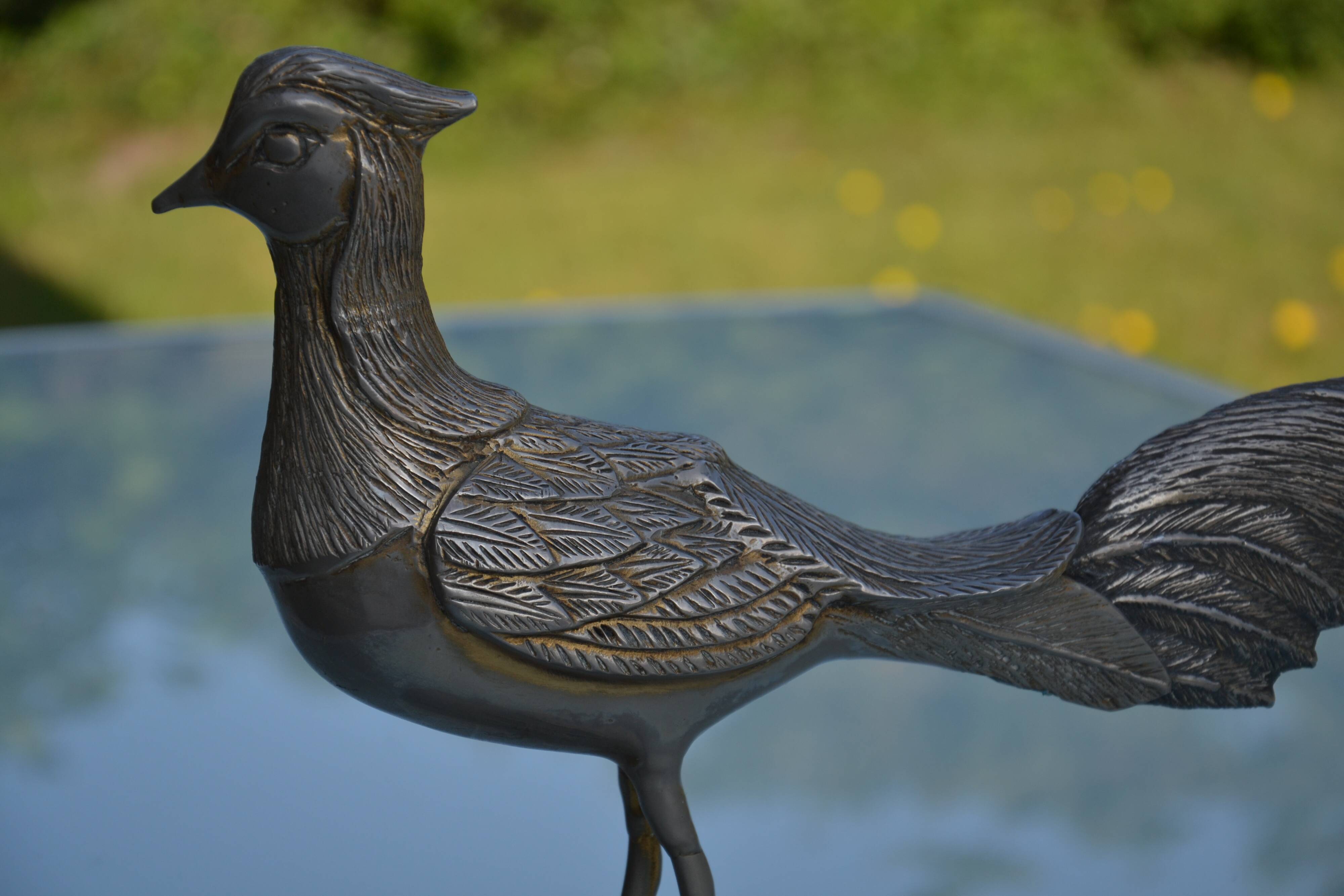 Brass peacock sculpture