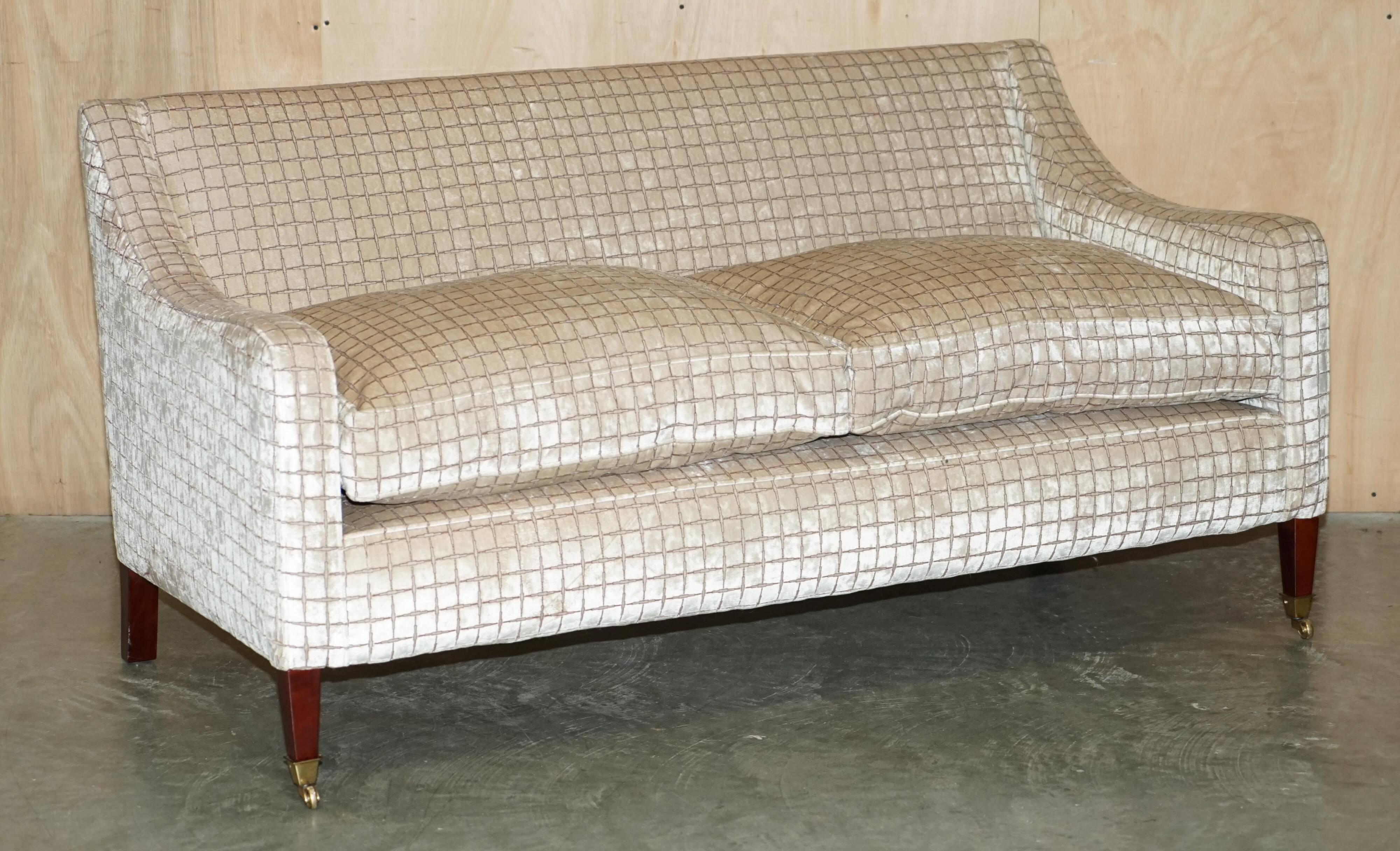 Fabric sofa and footstool, handmade in England.