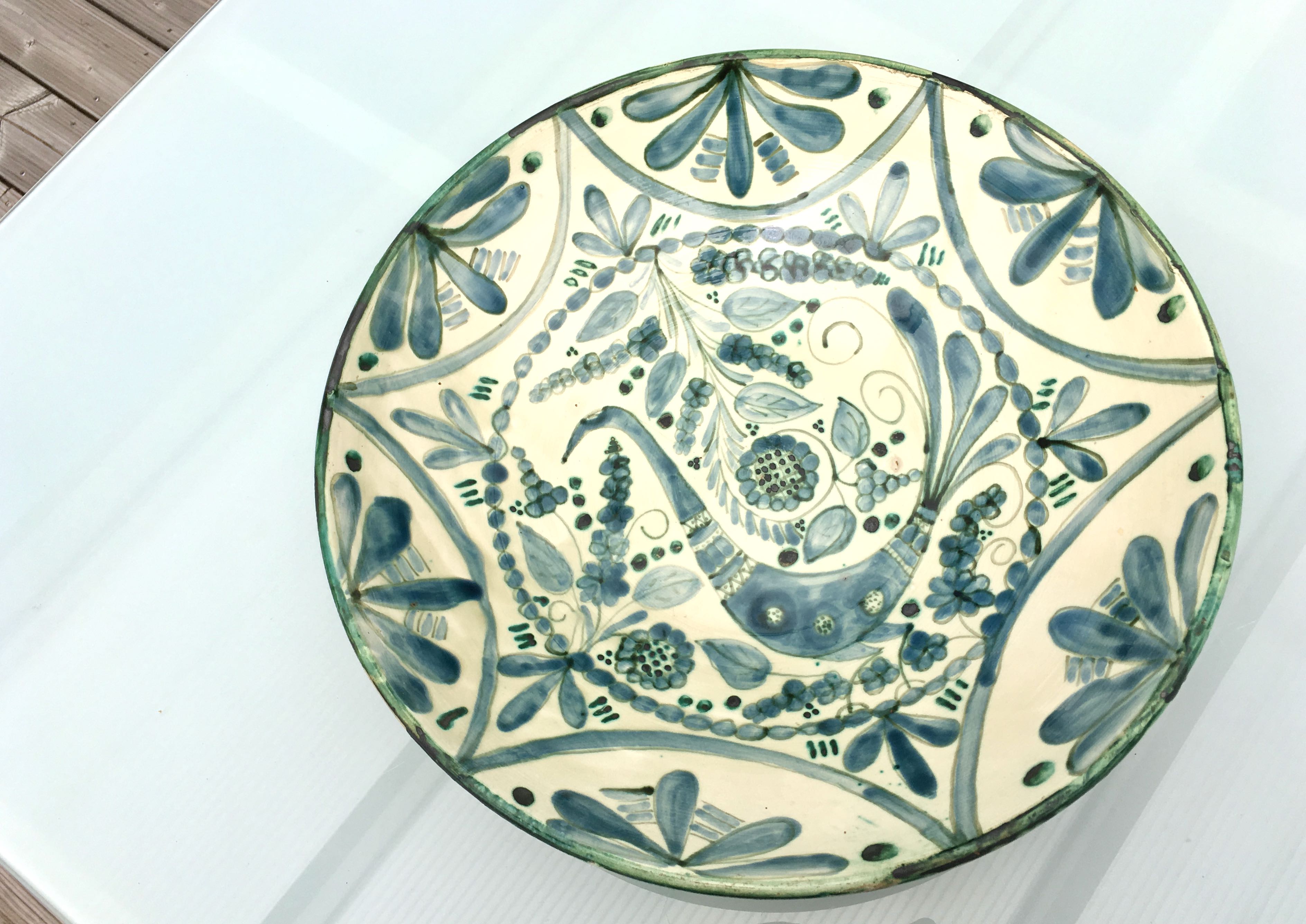 Large ceramic fruit cup with blue peacock