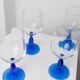Set of 4 vintage Italian glass wine glasses, clear bowls with royal blue stems, 1980s MCM style