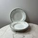 Set of 4 deep plates from Saint Amand with laurel wreath decoration.
