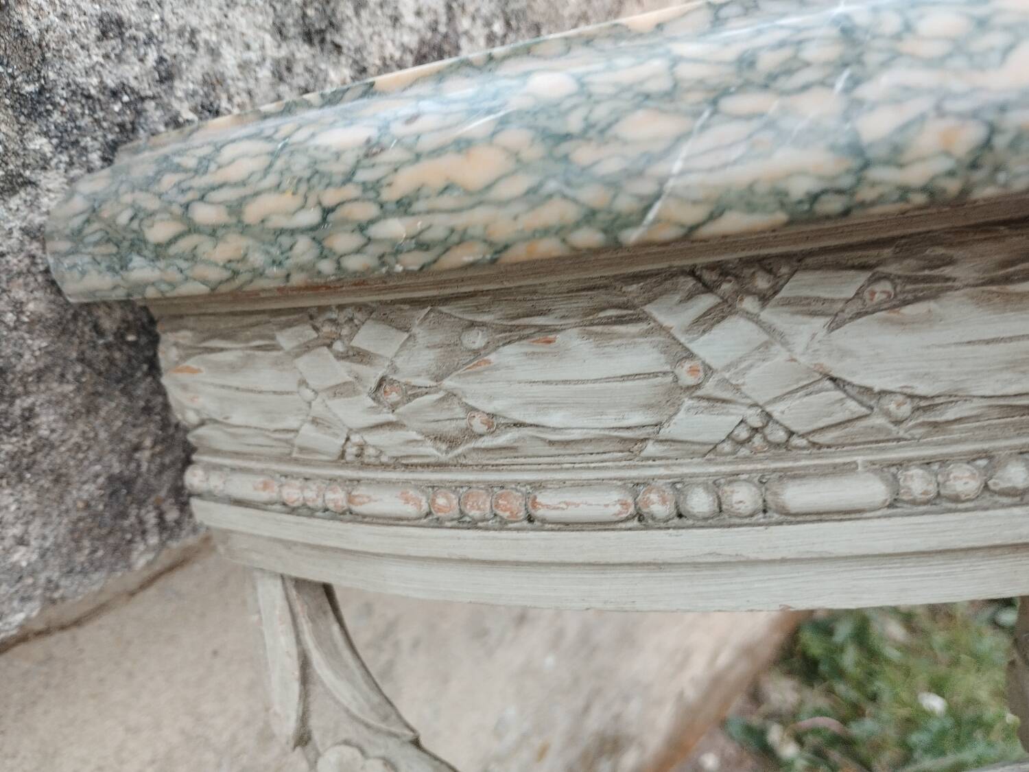 Beautiful antique wooden console with a marble top in Louis XVI style.