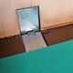 Underhand in saddle leather and vintage brushed metal