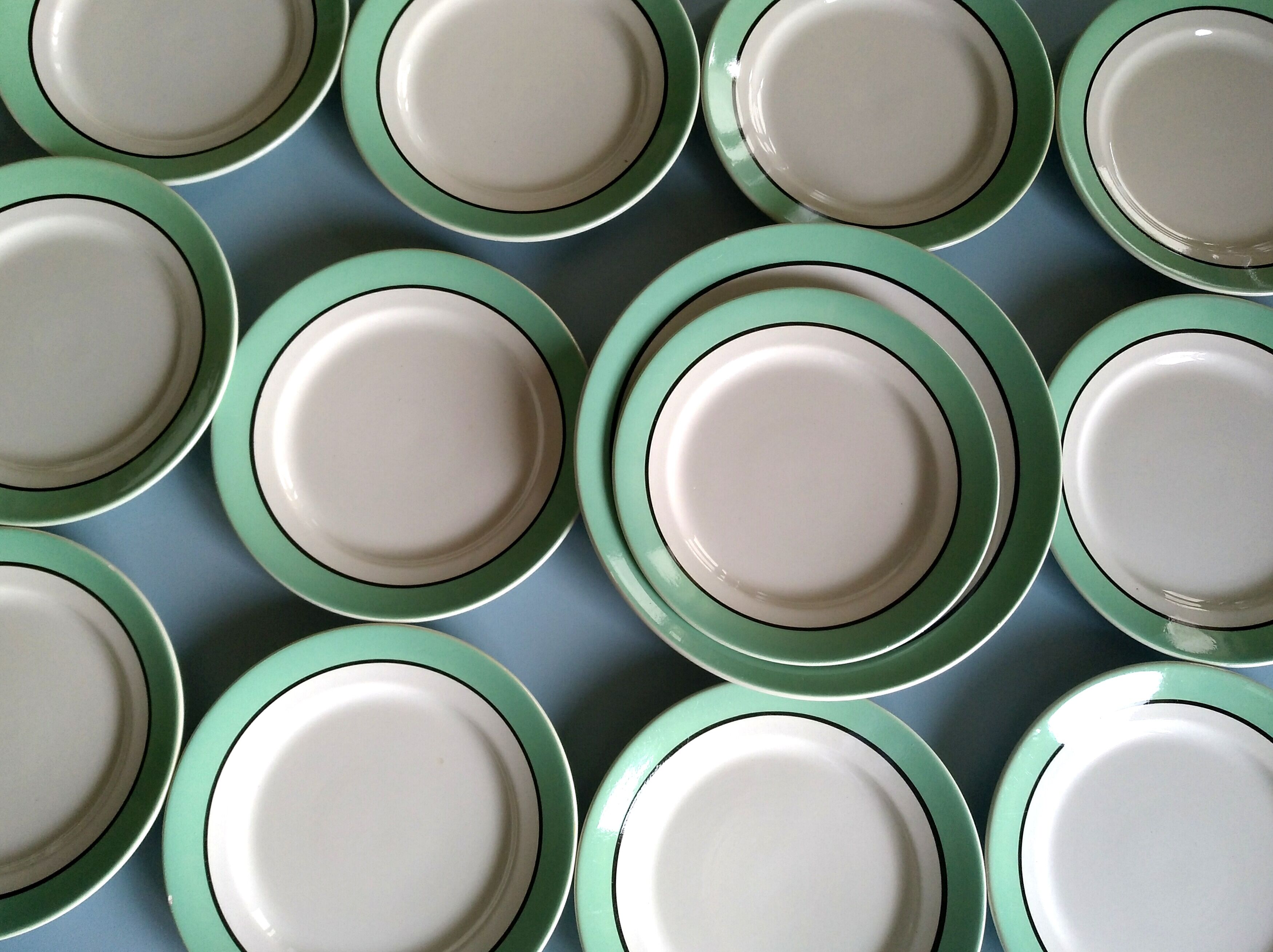 12 service plates and 1 green plate mint