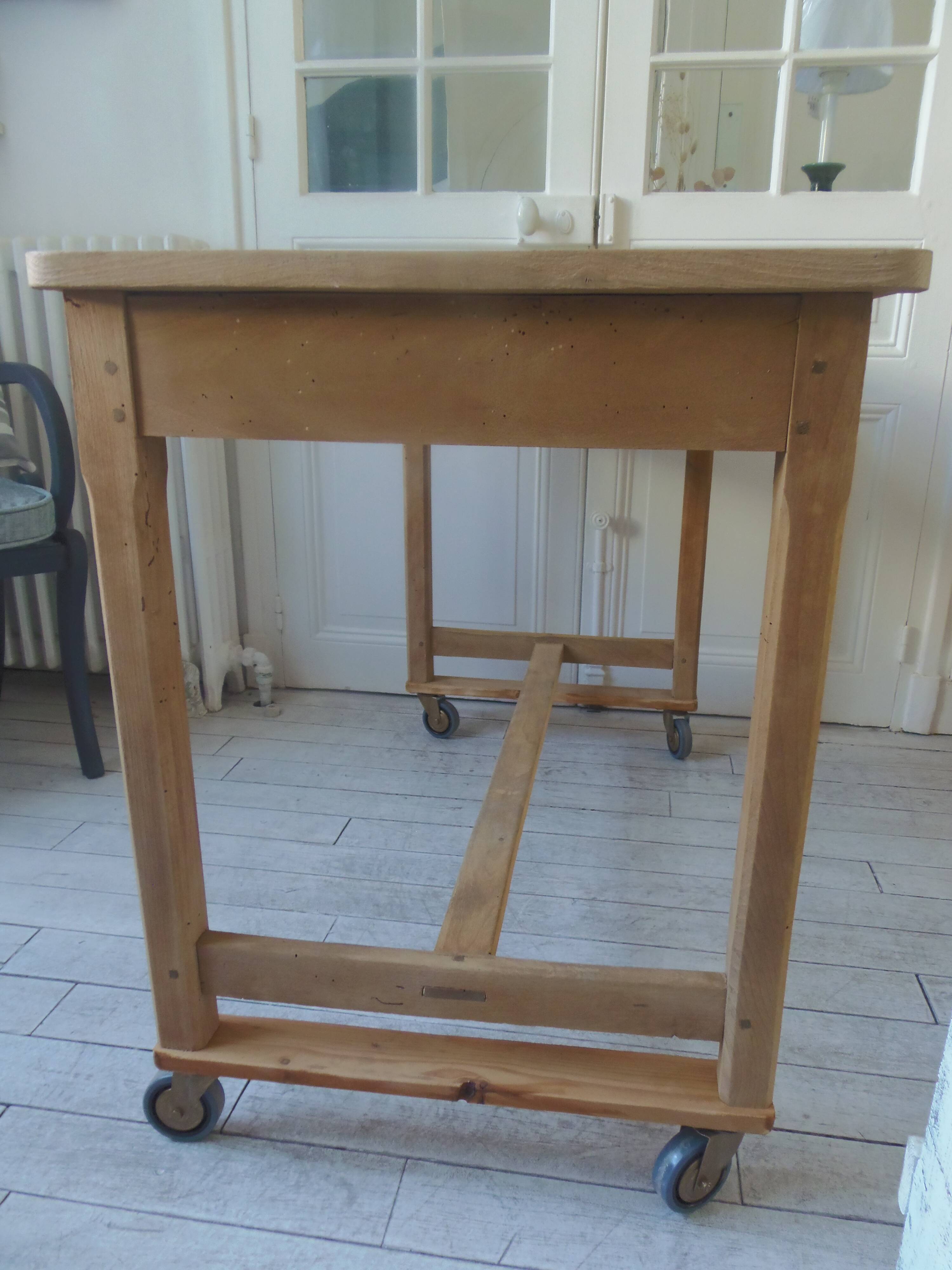 Vintage kitchen table on casters.
