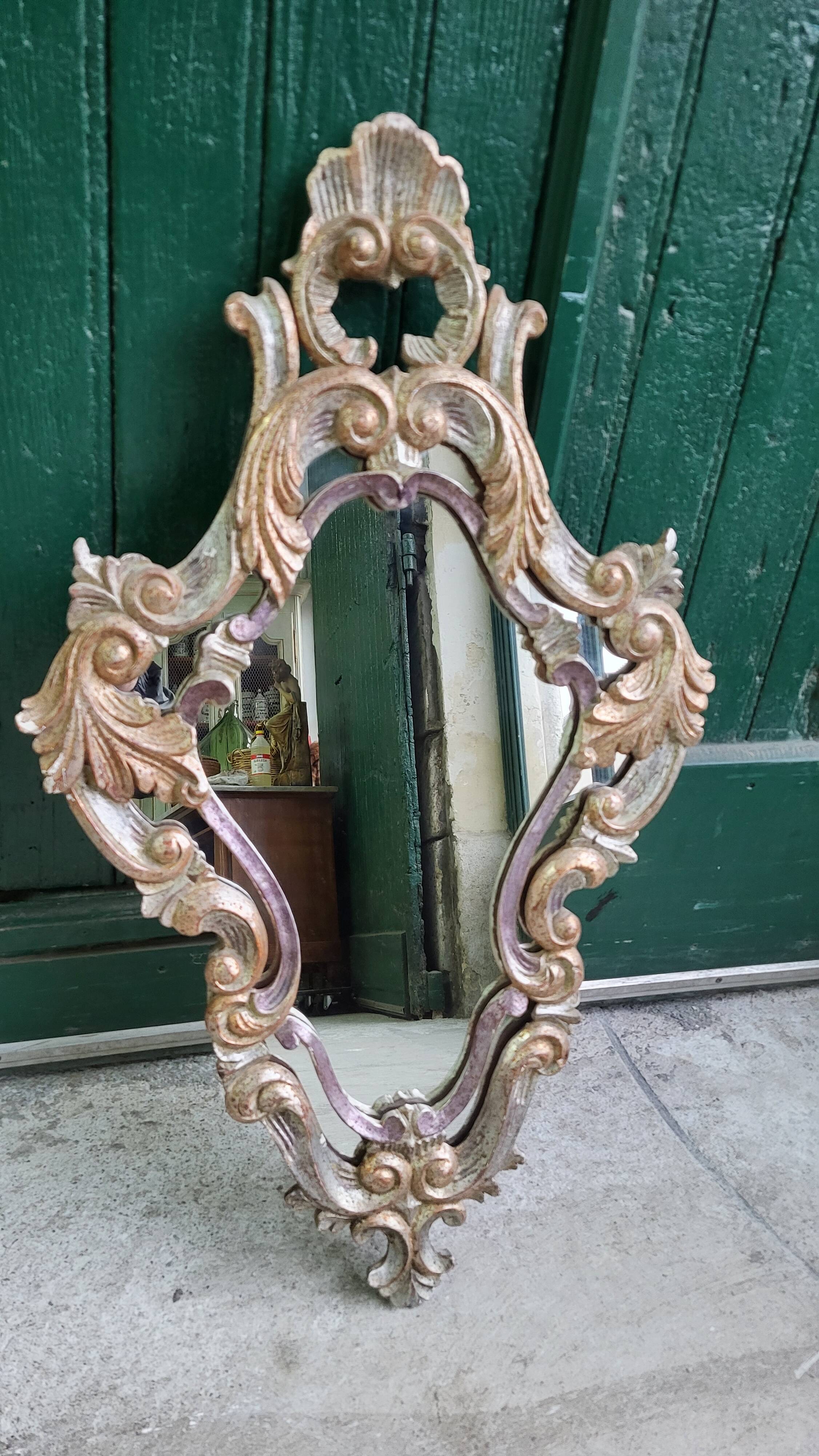 MIRROR IN LOUIS XV STYLE WITH GILDING AND SILVERING